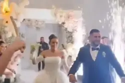 Moment couple’s wedding entrance is ‘ruined’ as venue catches on fire